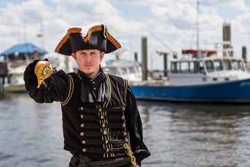 pirate standing on a pier